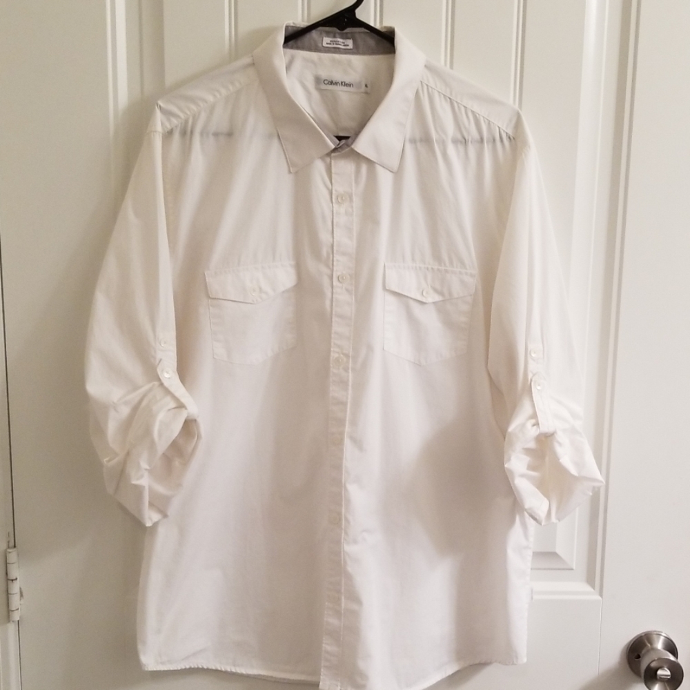 Men's White Calvin Klein shirt.